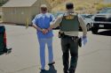 Andrew James Lee in handcuffs—TCSO photo
