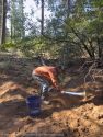 Volunteers learning sustainable trail design—STF photo