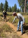 Volunteers learning sustainable trail design—STF photo