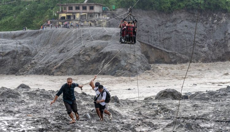 Photos show aftermath of flash floods in Nepal
