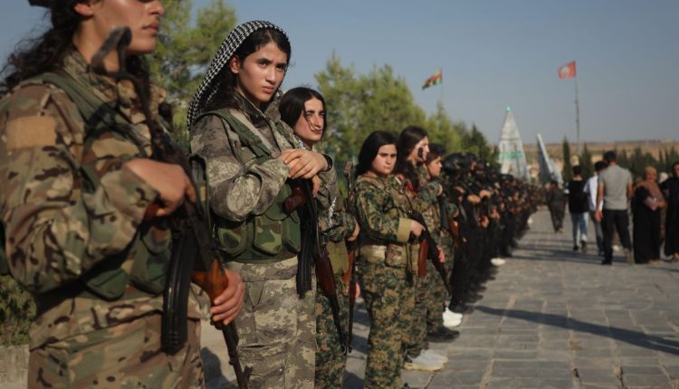 Photos of the funeral for victims of a deadly prison fire and riot in northern Syria