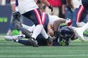 Photos of the NFL season opener, a rare Super Bowl rematch between the Seahawks and Patriots
