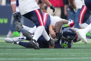 Photos of the NFL season opener, a rare Super Bowl rematch between the Seahawks and Patriots