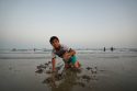 Photos show daily life in Iran on the beach along the Strait of Hormuz