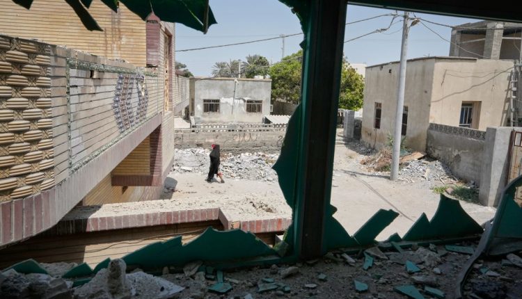 Photos show destruction and mourning after a strike on an Iranian wedding