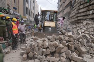 Pancaked floors, piles of concrete after Nairobi building collapse, in photos