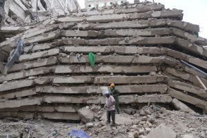 Pancaked floors, piles of concrete after Nairobi building collapse, in photos