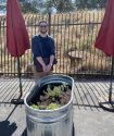 Tyler Stump with new gardening containers at the Food Bank -- ATCAA photo
